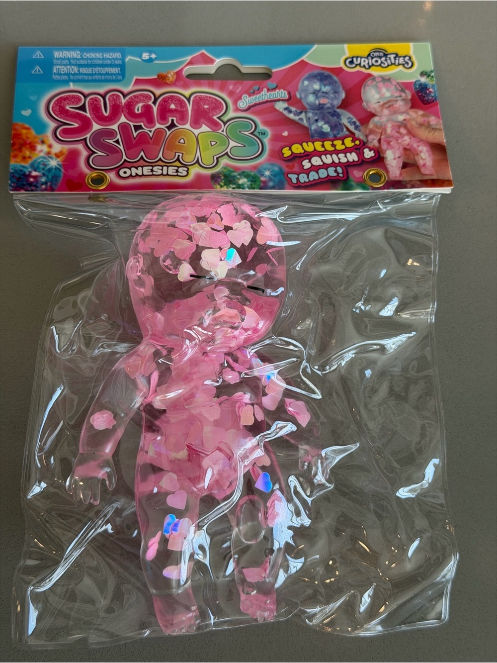 Sugar Swaps Pink Onesie Squeeze Toy - Pink Heart Confetti